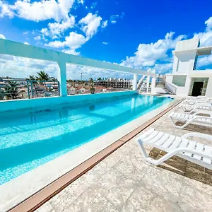 https://hotel-rooftop-pool-suites-studios-dukassi-sol-caribe.comcaribbean.com